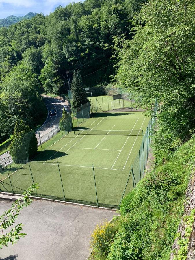 Appartamento Timeless Con Piscina E Tennis Valbrona Bagian luar foto