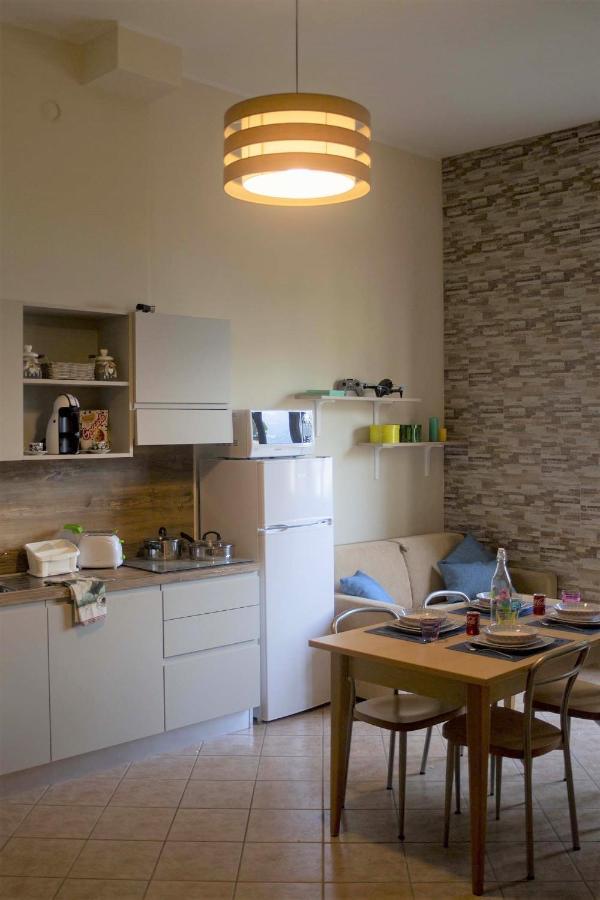 Appartamento Timeless Con Piscina E Tennis Valbrona Bagian luar foto
